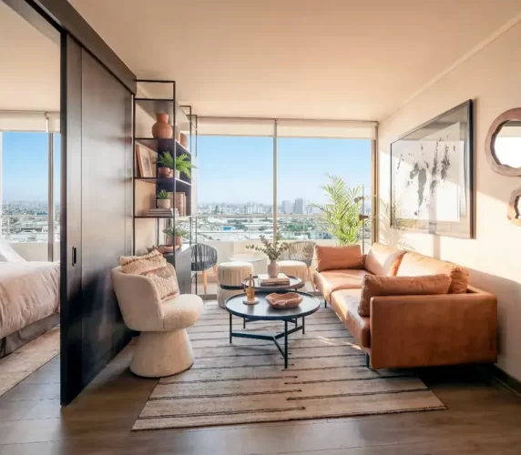 Living comedor grandes espacios, sillón en los costados, venta con bono pie la Cisterna.