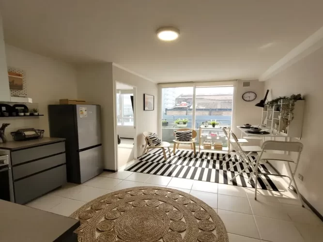 Living comedor vista banlcon departamento Quinta Normal sin ahorros