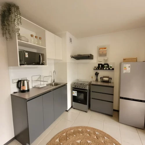 Cocina amoblada Departamento 1D1B 32 M2 Entrega Inmediata en Quinta Normal venta con bono pie, Cecano a Metro linea 7