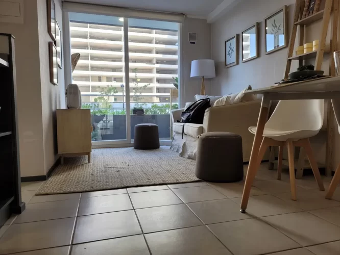 Living comedor balcon mucha luz departamento en venta la Cisterna entrega inmediata venta con bono pie metro el Parron