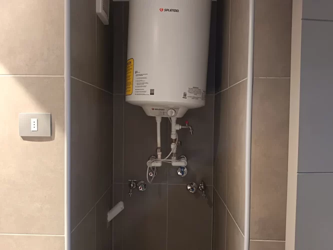 Espacio para termo y lavadora venta departamento San Bernardo con ayuda para el pie