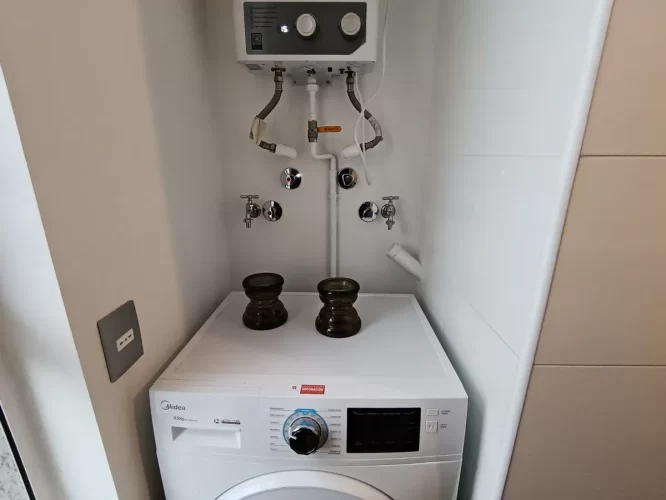 Espacio para lavadora y termo departamento San Bernardo entrega inmediata