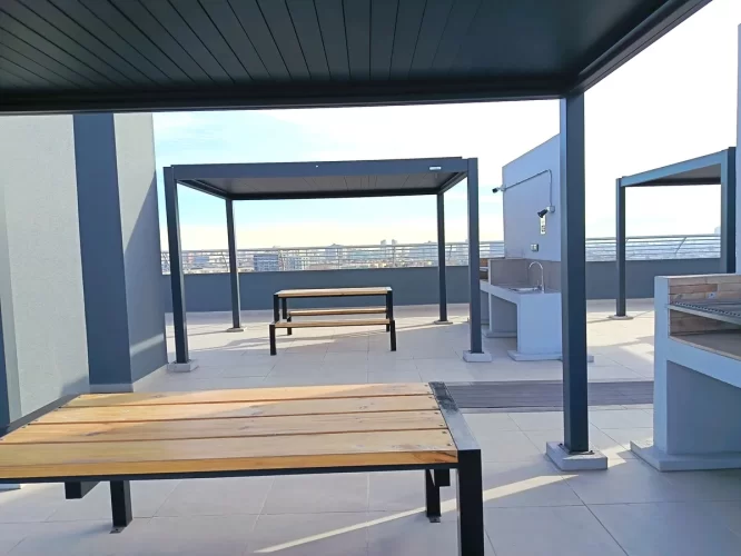 Quinchos en edificio en azotea, venta departamento San Joaquín.